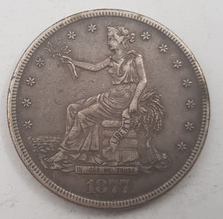 Trade dollar 1877 S kv. 1+